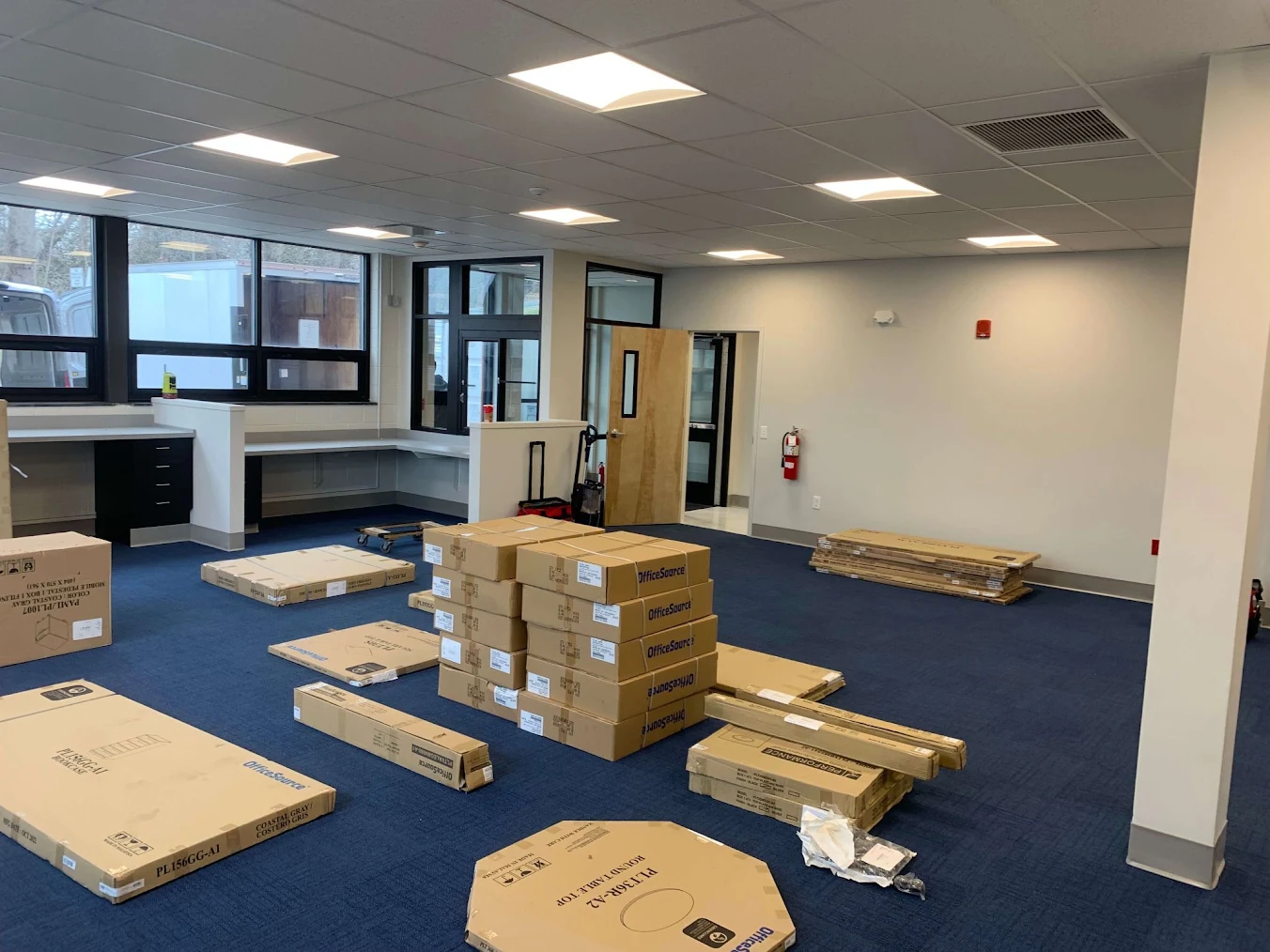 Office furniture ready for installation.